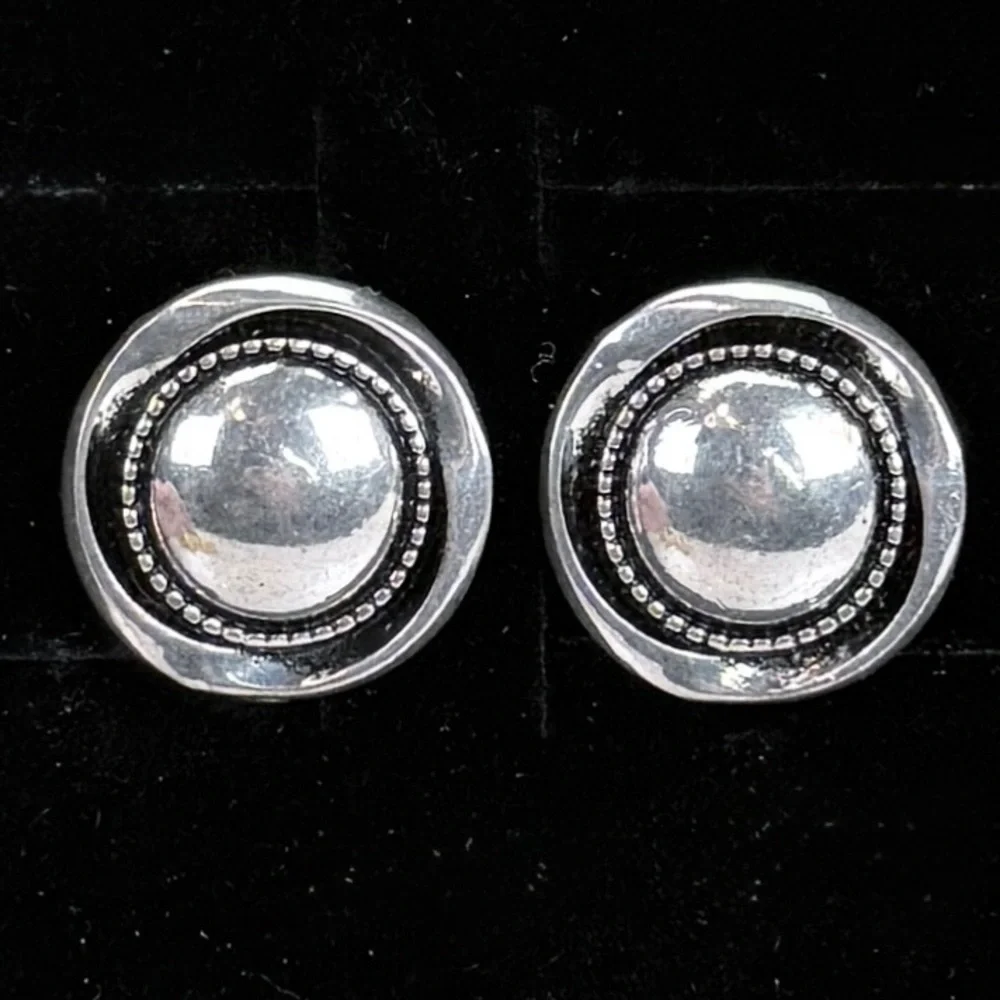 Vintage Silvertone round weighted clip on earrings